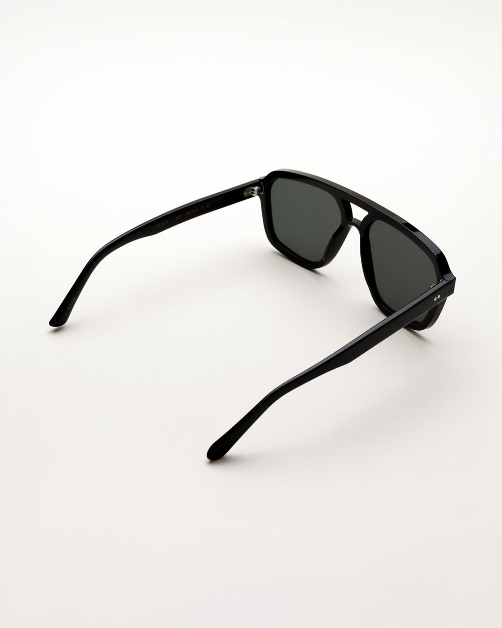 Jet Black - green solid lens