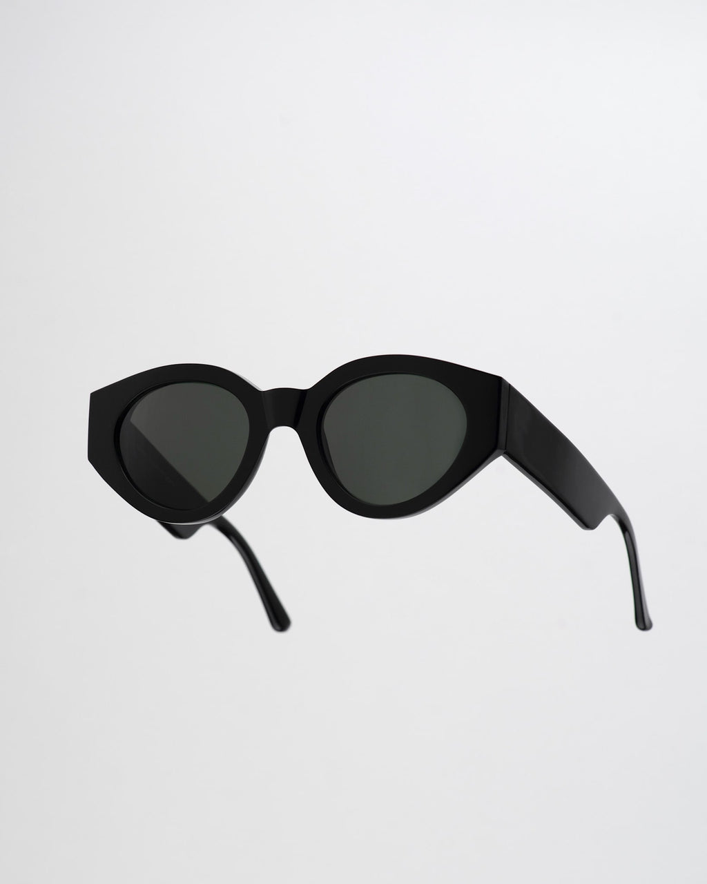Polly Black - green solid lens